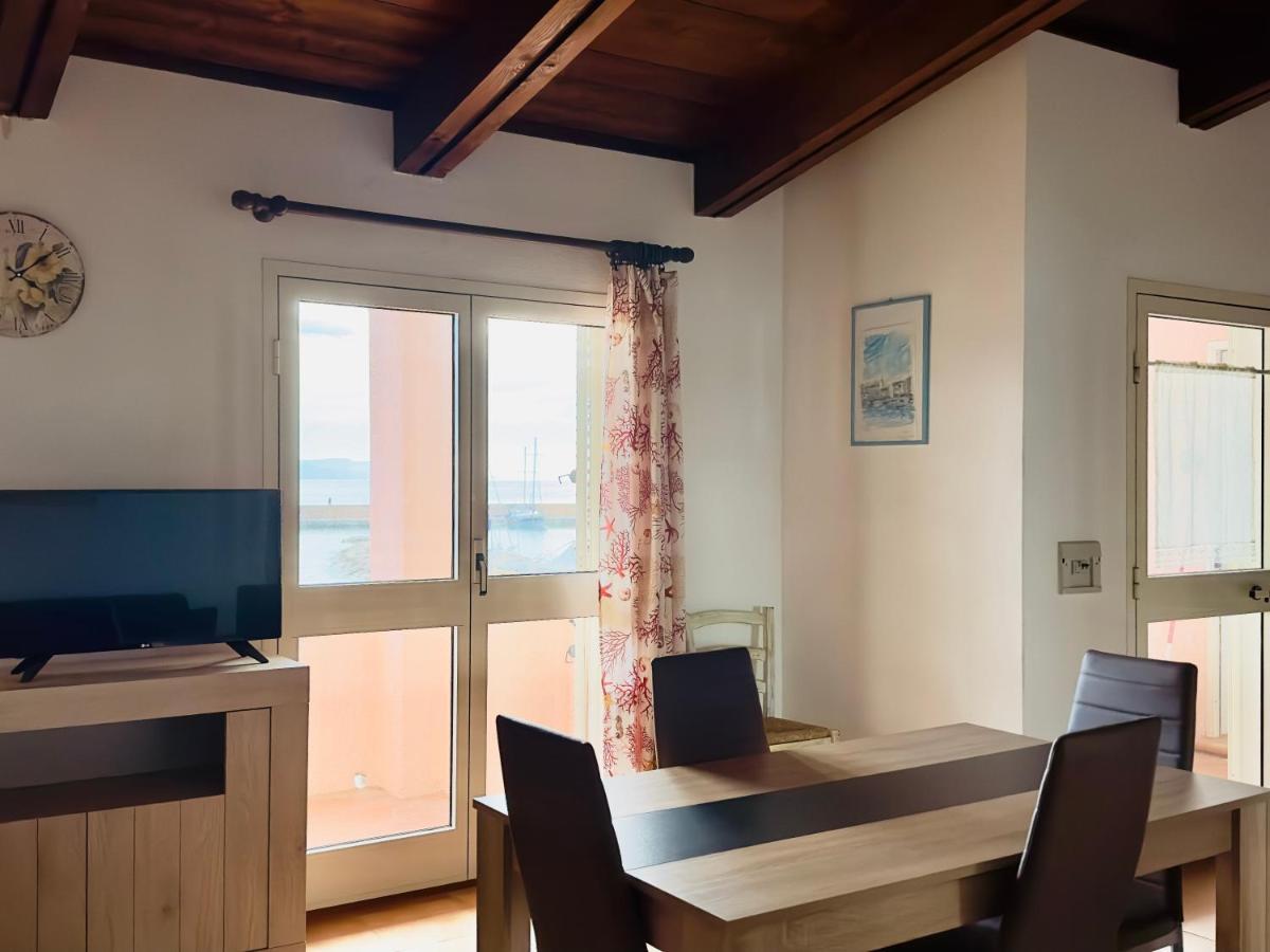 Approdo Apartments Isola Rossa Exterior photo